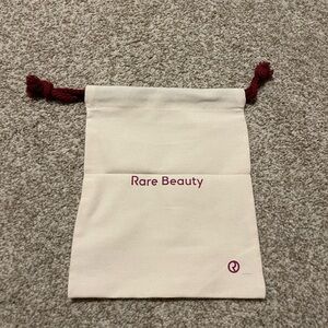 Rare Beauty Ivory Pouch with Burgundy Accents